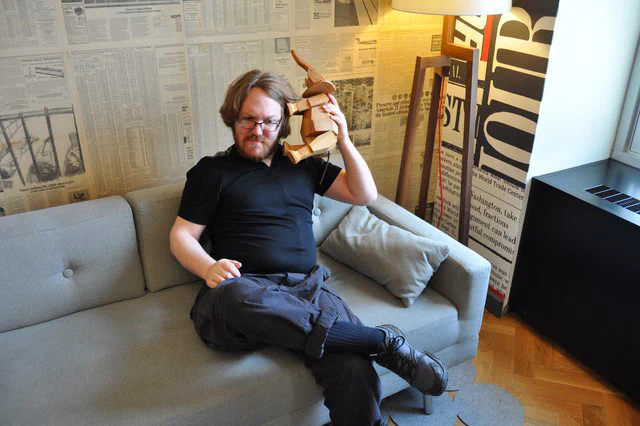 Modern couch with decorative wooden elephant