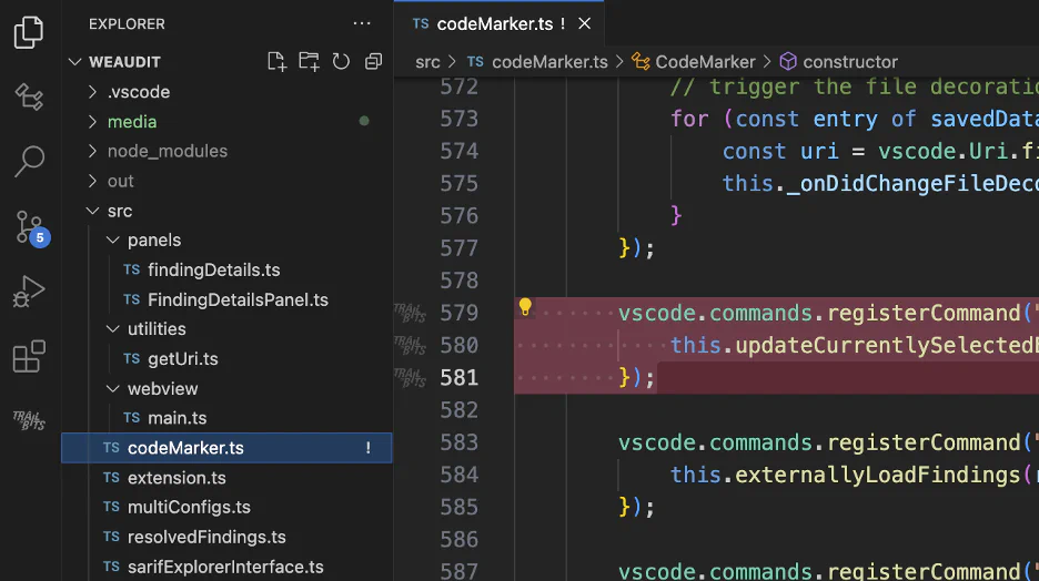 VSCode file tree and tab showing the “!” annotation for a file with a finding